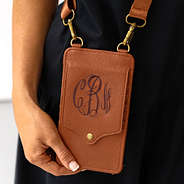 monogrammed phone crossbody in brown close up with chocolate thread