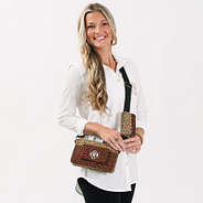 girl wearing camel dottie personalized crossbody