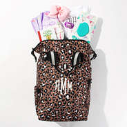 leopard diaper backpack flatlay