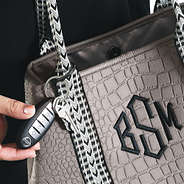 detail shot of taupe textured neoprene tote