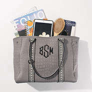 spill shot of taupe textured neoprene tote