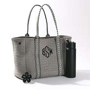 studio shot of taupe textured neoprene tote