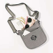 spill shot of taupe textured neoprene crossbody