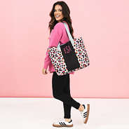 sunset leopard tote bag on shoulder