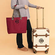 maroon monogrammed tote bag with luggage