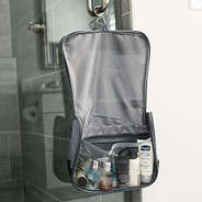 charcoal hanging toiletry bag hanging on shower
