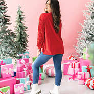 back of red christmas sweatshirt