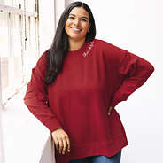 burgundy thankful sweatshirt on julia in studio