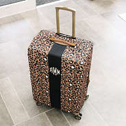 top of monogrammed leopard luggage cover