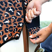 zipping cheetah luggage cover up