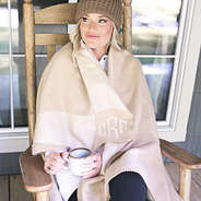 girl wrapped in checkered blanket