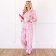 girl wearing pink cheetah monogrammed softspun pajama set