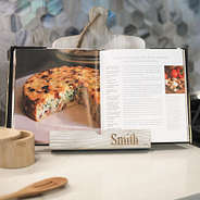 light tan cookbook stand with recipe book open