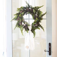 ivory wreath sash on door