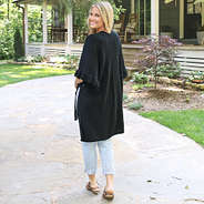 back of black cardigan poncho