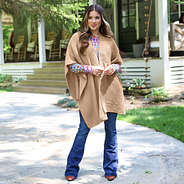 open front poncho wrap styled with denim outside
