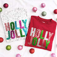close up of white cheetah and crimson holly jolly sweatshirts