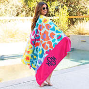 brunette wrapped in leopard luau personalized beach towel