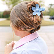 blue hair flower claw clip pinned up in hair