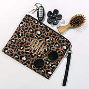 cheetah wristlet and neutral flower claw clip