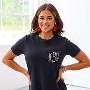 red earrings on ears