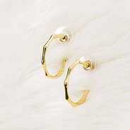 bamboo hoops on white fur