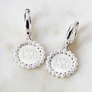 Monogrammed Huggie Hoop Earrings in Silver on marble