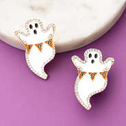 ghost earrings on purple background