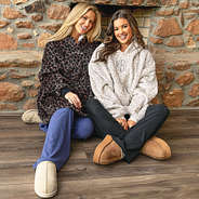 girls wearing snow leopard and sable cheetah blanket hoodies