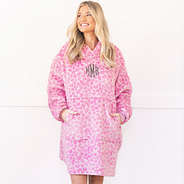 close up of girl wearing pink cheetah monogrammed blanket hoodie