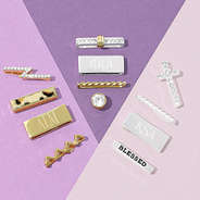 silver gold and multi silver smart watch charm sets on paper