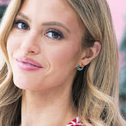 christmas wreath green earrings in ear