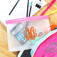 pink airtight dry bag with school supplies