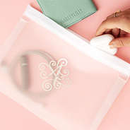 white airtight dry bag on pink paper