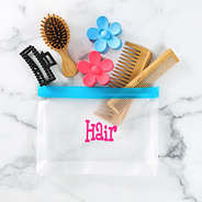 blue airtight dry bag with hair accessories