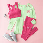 hot pink outfit flatlay with leggings