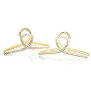 hair clip set in gold in studio