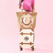 monogrammed pink sun hat carrier with luggage