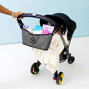 monogrammed heathered grey stroller caddy on stroller with baby