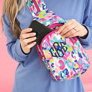 watercolor cheetah sling backpack on ashley up close