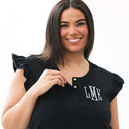 close up of black ruffle monogrammed sleep set