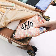 packing packable backpack in zippered hardshell suitcase