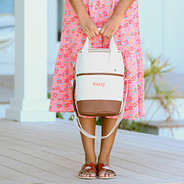 tall cooler with family name and rosewood valley dress