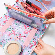 open and detached pouches on french floral toiletry kit