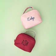 duo makeup bags in autumn whimsy and maroon