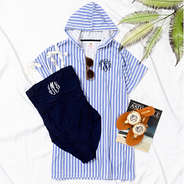 terry cover up with navy one piece bathing suit