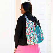 pickeball bag worn as a sling bag on back