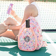 girl on court with coral floral monogrammed pickle ball bag