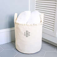 ivory storage basket with towels