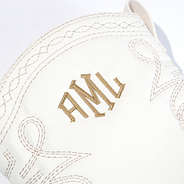 close up of monogrammed cowboy boots